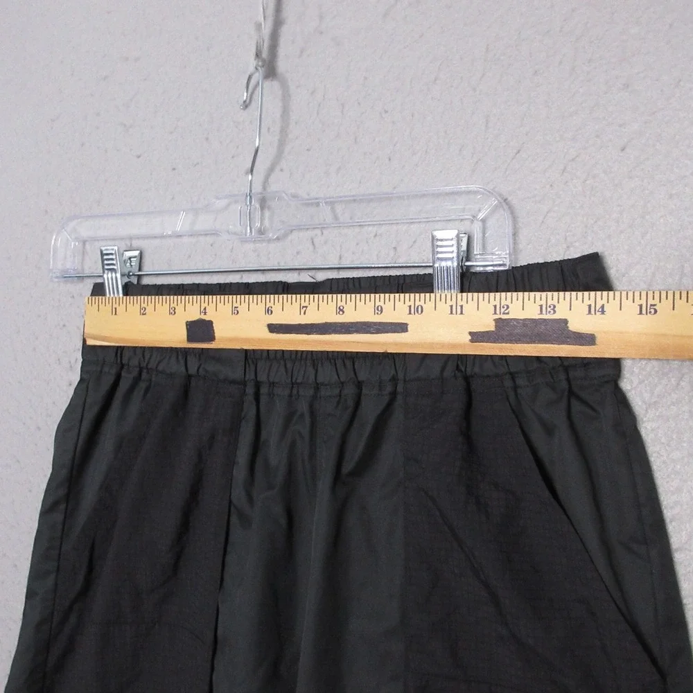 Nike Sportwear Joggers Pants Women Medium Black Woven Swoosh Sporty Windbreaker